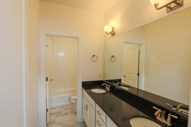 1023 Echelon Dr, Franklin, TN 37064 - bathroom featuring double vanity, marble look tiles, and shower / bathtub combination