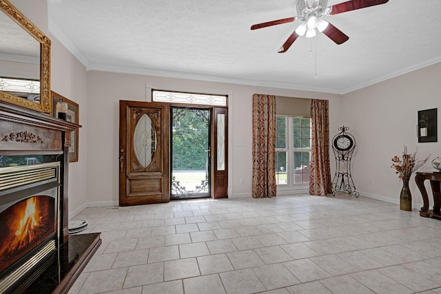 398 N Hummingbird Ln, Dickson, TN 37055 - foyer featuring crown molding, a ceiling fan, a textured ceiling, and light tile patterned floors