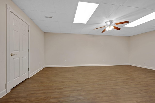 398 N Hummingbird Ln, Dickson, TN 37055 - empty room featuring ceiling fan, wood finished floors, and a drop ceiling