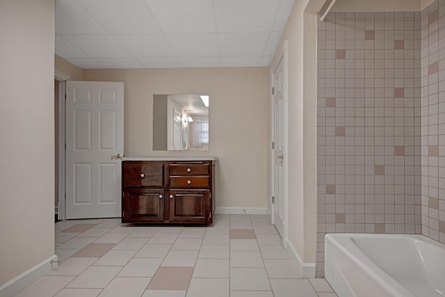 398 N Hummingbird Ln, Dickson, TN 37055 - full bath featuring tile patterned floors, vanity, and a paneled ceiling