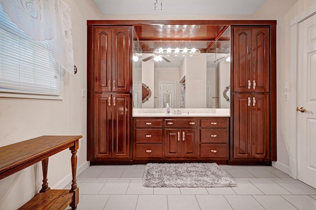 398 N Hummingbird Ln, Dickson, TN 37055 - bathroom with vanity, ceiling fan, and tile patterned flooring
