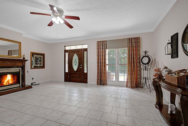 398 N Hummingbird Ln, Dickson, TN 37055 - entryway with ornamental molding, a ceiling fan, a glass covered fireplace, a textured ceiling, and light tile patterned flooring