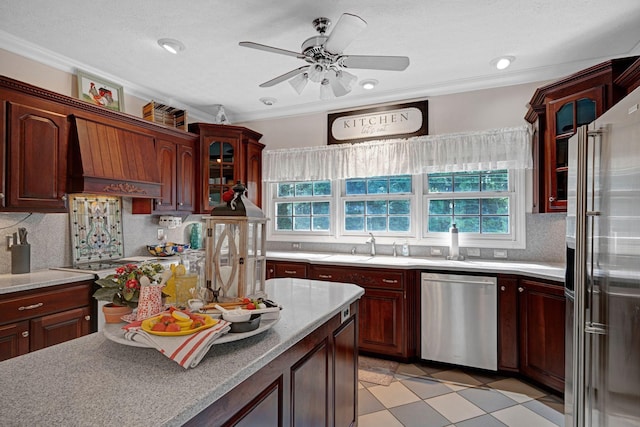 398 N Hummingbird Ln, Dickson, TN 37055 - kitchen featuring appliances with stainless steel finishes, healthy amount of natural light, tasteful backsplash, glass insert cabinets, and crown molding