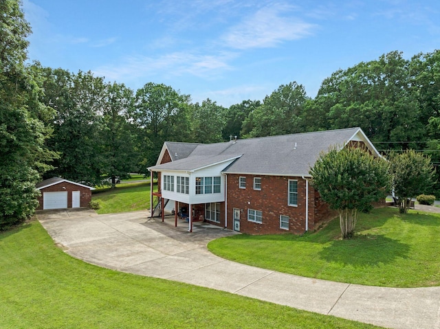 398 N Hummingbird Ln, Dickson, TN 37055 - view of front of property with an outbuilding, stairs, a detached garage, brick siding, and a front yard