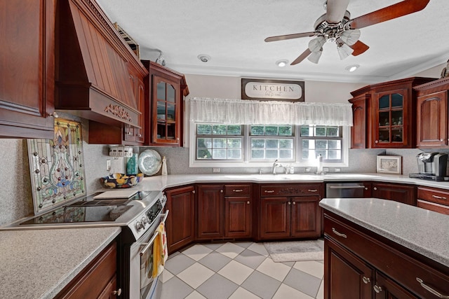 398 N Hummingbird Ln, Dickson, TN 37055 - kitchen with appliances with stainless steel finishes, custom exhaust hood, healthy amount of natural light, a ceiling fan, and crown molding