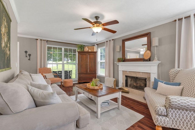 805 Tunewood Ct, Hermitage, TN 37076 - living room featuring ornamental molding, light wood-type flooring, ceiling fan, and a premium fireplace