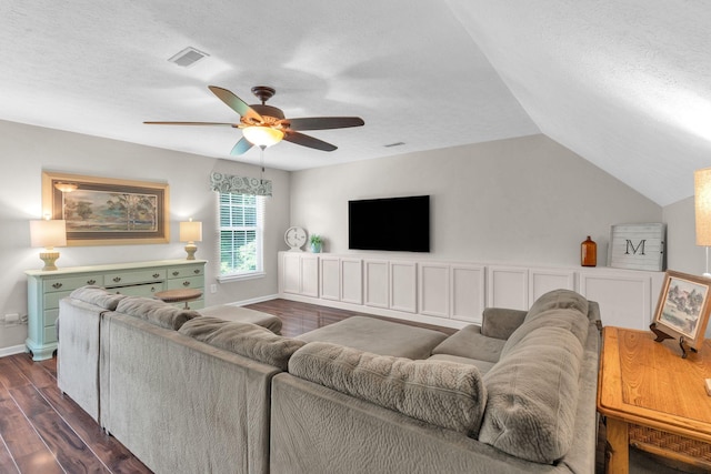 805 Tunewood Ct, Hermitage, TN 37076 - living room featuring dark wood finished floors, a textured ceiling, a ceiling fan, and vaulted ceiling