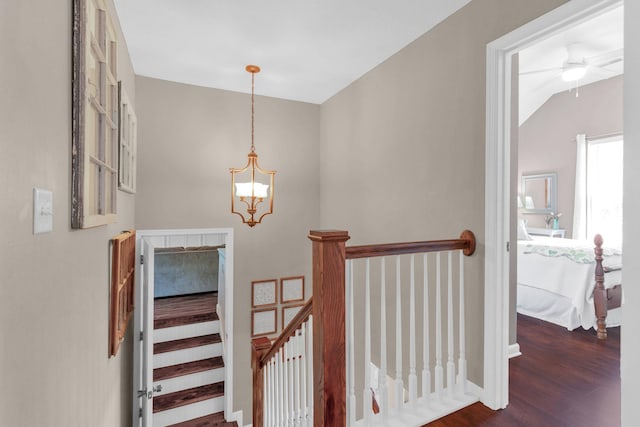805 Tunewood Ct, Hermitage, TN 37076 - stairs with wood finished floors, a chandelier, vaulted ceiling, and a ceiling fan