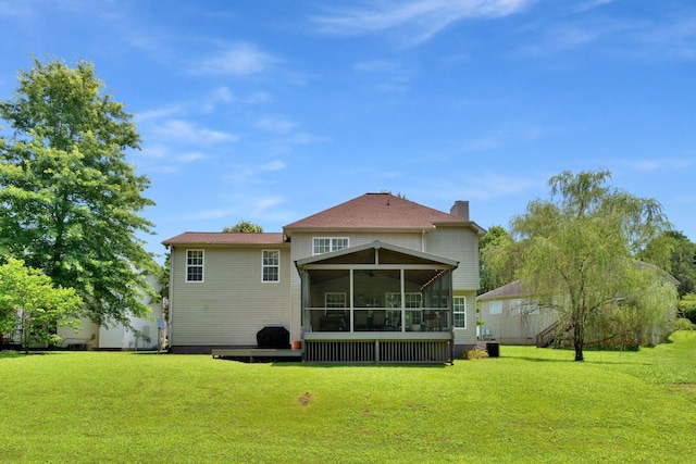 805 Tunewood Ct, Hermitage, TN 37076 - back of property with a sunroom, a yard, and a chimney