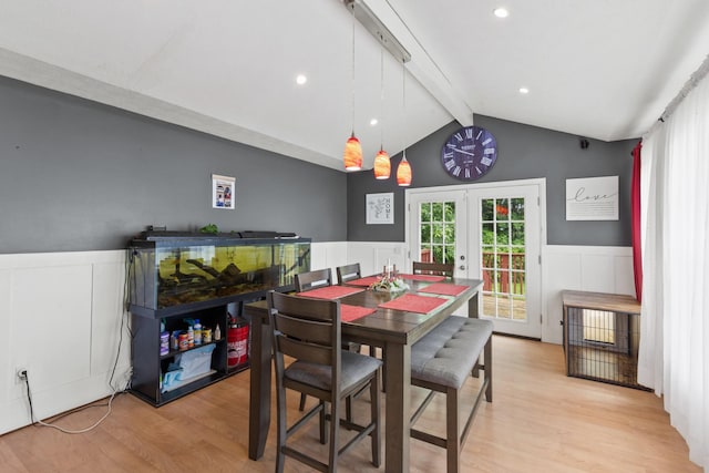 149 Cora St, Portland, TN 37148 - dining area with french doors, wainscoting, light wood-style floors, and a decorative wall