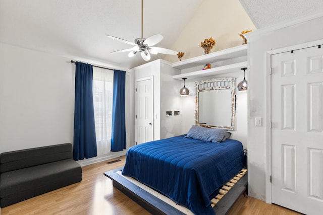 149 Cora St, Portland, TN 37148 - bedroom featuring light wood-type flooring, high vaulted ceiling, and a ceiling fan