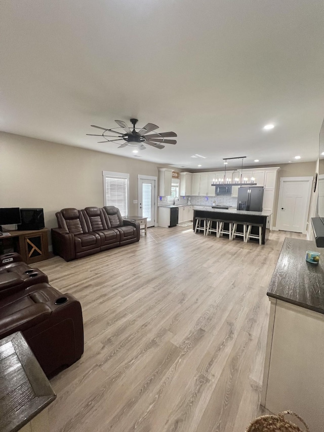108 Chase Bend Rd, Estill Springs, TN 37330 - living room featuring light wood-type flooring, a ceiling fan, and recessed lighting