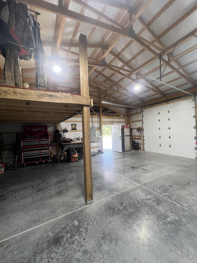 108 Chase Bend Rd, Estill Springs, TN 37330 - garage featuring freestanding refrigerator