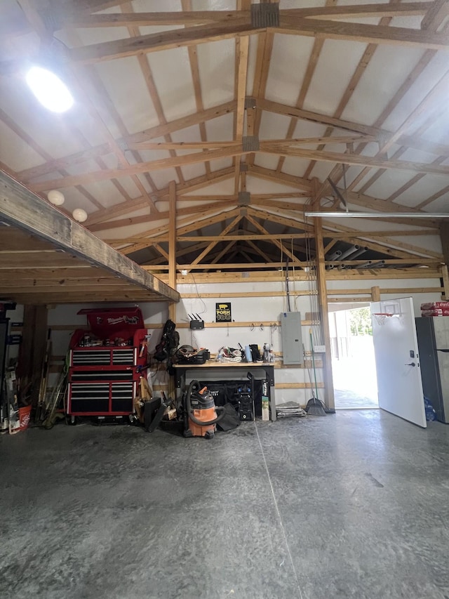 108 Chase Bend Rd, Estill Springs, TN 37330 - garage with electric panel and a workshop area