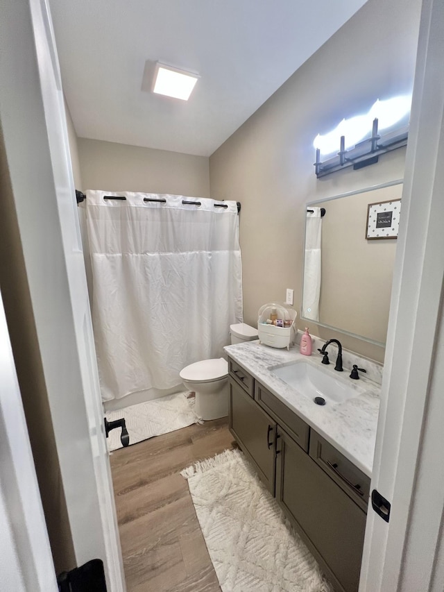 108 Chase Bend Rd, Estill Springs, TN 37330 - bathroom with wood finished floors, vanity, and shower / bathtub combination with curtain
