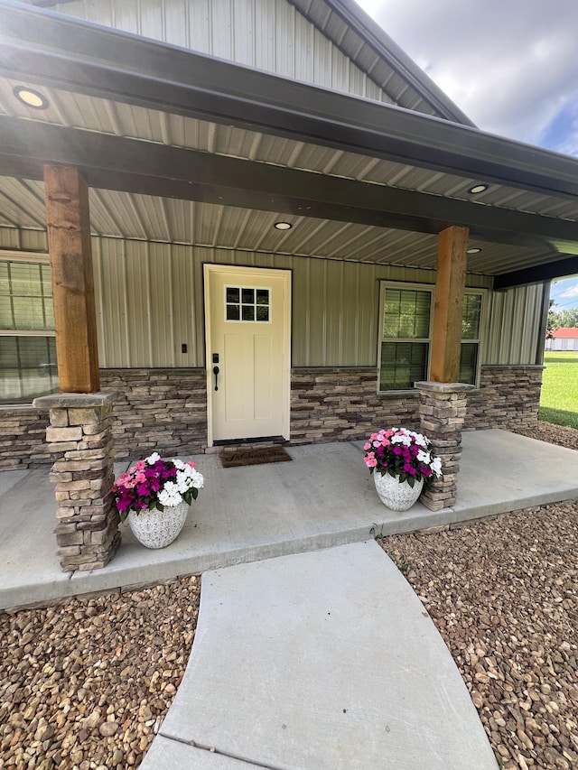 108 Chase Bend Rd, Estill Springs, TN 37330 - property entrance with stone siding, a porch, and board and batten siding