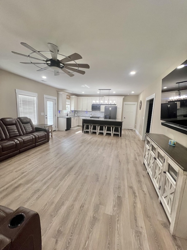 108 Chase Bend Rd, Estill Springs, TN 37330 - living room featuring ceiling fan, light wood-style floors, and recessed lighting