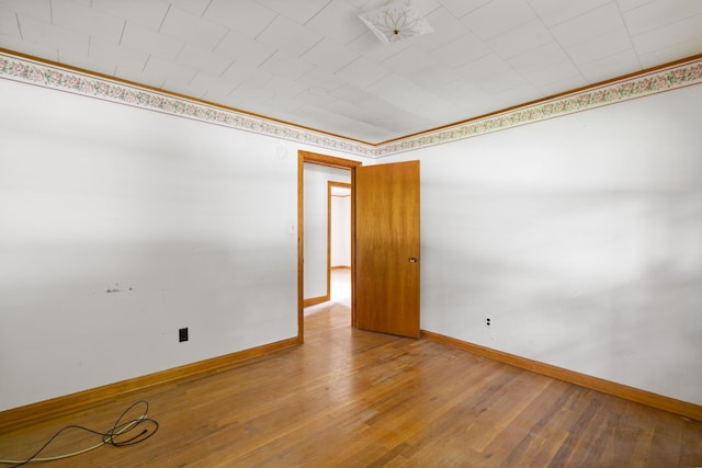 604 2nd Ave, Lawrenceburg, TN 38464 - spare room with baseboards and light wood finished floors
