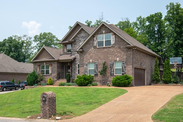 31 Harbor Pt, Lebanon, TN 37087 - craftsman house featuring driveway, brick siding, a front yard, and roof with shingles