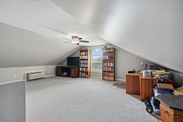 1908 Pointe Barton Dr, Lebanon, TN 37087 - office area with a wall mounted AC, lofted ceiling, carpet floors, ceiling fan, and a textured ceiling