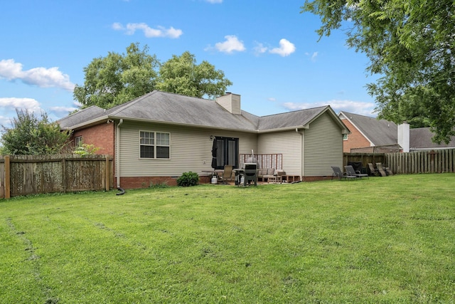 1908 Pointe Barton Dr, Lebanon, TN 37087 - back of property with a fenced backyard and a chimney