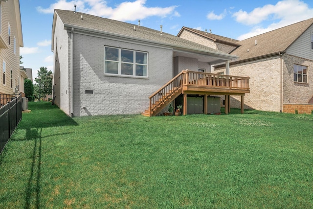 312 Rafferty Ct, Franklin, TN 37064 - back of property featuring stairway, brick siding, a wooden deck, and roof with shingles