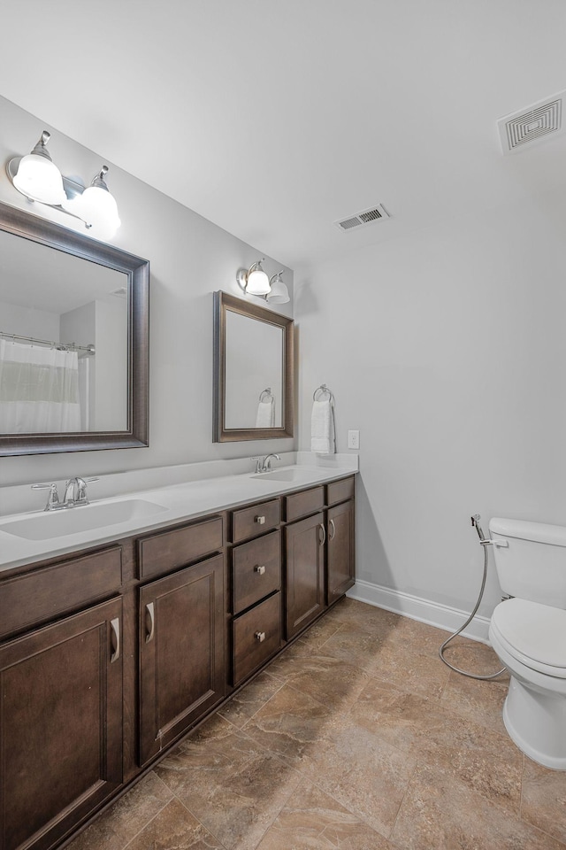 312 Rafferty Ct, Franklin, TN 37064 - full bath featuring double vanity and stone finish flooring