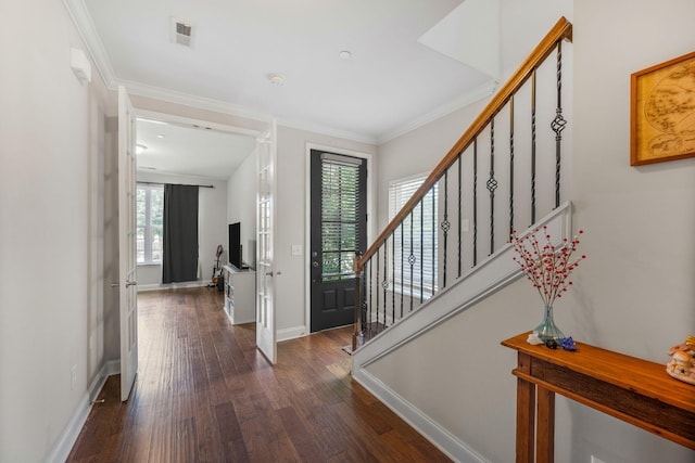 312 Rafferty Ct, Franklin, TN 37064 - foyer with dark wood-style flooring, crown molding, and stairs