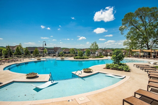 312 Rafferty Ct, Franklin, TN 37064 - community pool featuring a patio area and a residential view