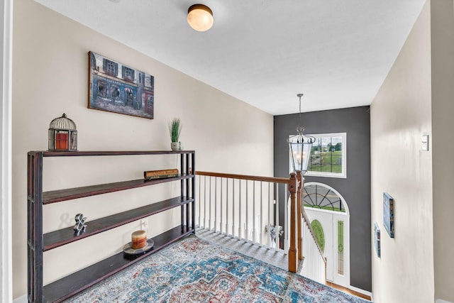 3299 Twelve Oaks Blvd, Clarksville, TN 37042 - hall featuring a chandelier and an upstairs landing