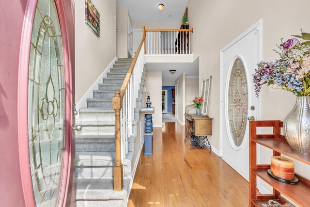 3299 Twelve Oaks Blvd, Clarksville, TN 37042 - foyer with a high ceiling, wood finished floors, and stairway