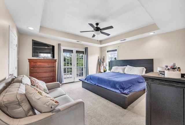 3299 Twelve Oaks Blvd, Clarksville, TN 37042 - carpeted bedroom featuring a tray ceiling, access to exterior, recessed lighting, and a ceiling fan