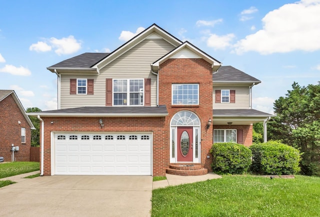 3299 Twelve Oaks Blvd, Clarksville, TN 37042 - traditional-style home with concrete driveway, a garage, brick siding, and a front lawn