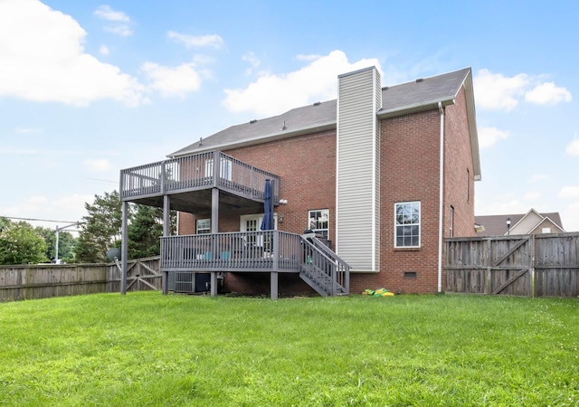 3299 Twelve Oaks Blvd, Clarksville, TN 37042 - rear view of house with a deck, a fenced backyard, brick siding, stairway, and a chimney