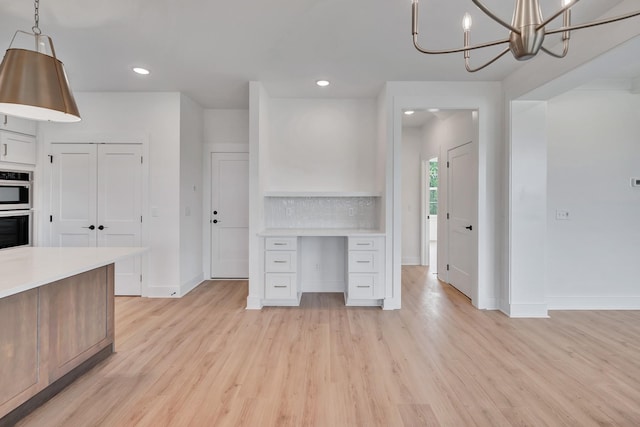 169 Willow Bend Dr, Hendersonville, TN 37075 - kitchen featuring double oven, light wood-type flooring, light countertops, white cabinetry, and recessed lighting