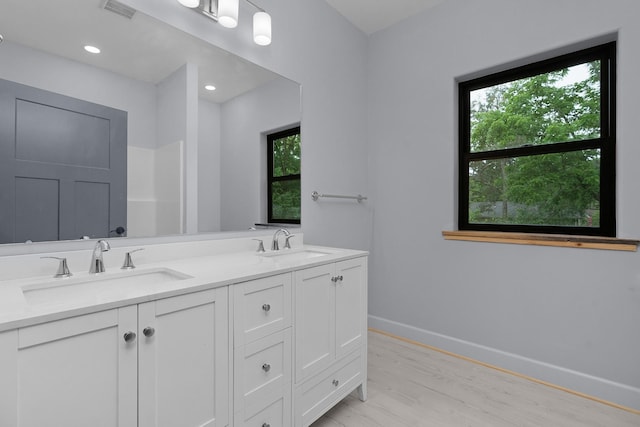 414 Ault Rd, Signal Mountain, TN 37377 - bathroom with double vanity and wood finished floors