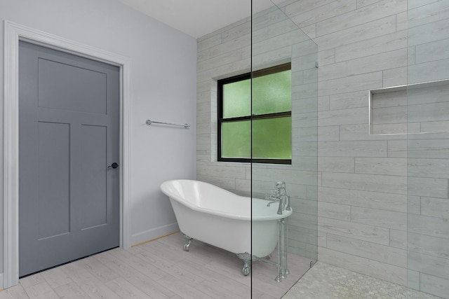 414 Ault Rd, Signal Mountain, TN 37377 - bathroom featuring a freestanding tub and wood finished floors