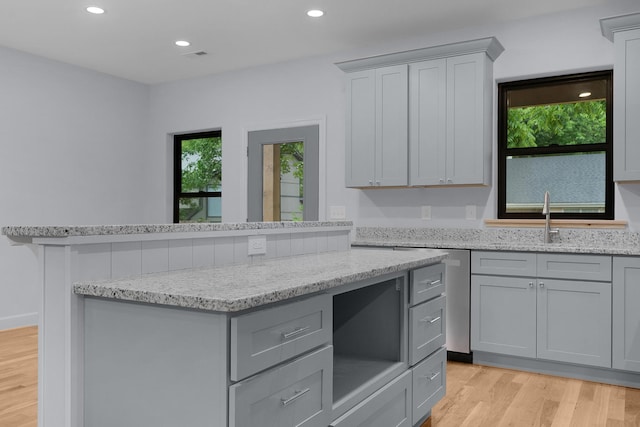 414 Ault Rd, Signal Mountain, TN 37377 - kitchen with gray cabinets, light wood finished floors, recessed lighting, and light stone countertops