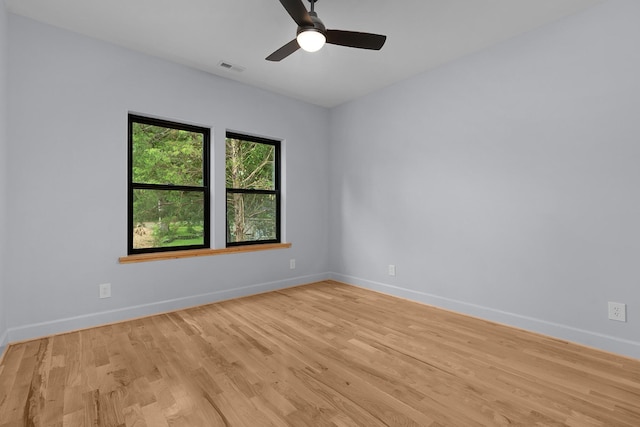 414 Ault Rd, Signal Mountain, TN 37377 - empty room with light wood finished floors and ceiling fan