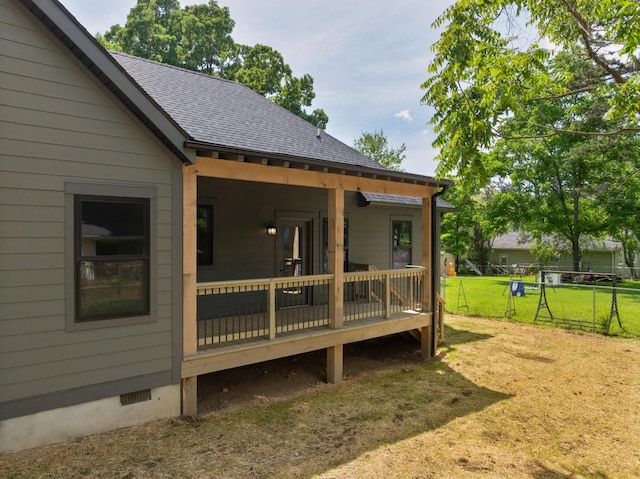 414 Ault Rd, Signal Mountain, TN 37377 - back of property featuring roof with shingles, crawl space, and a wooden deck
