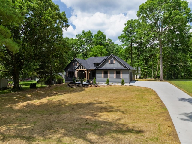 414 Ault Rd, Signal Mountain, TN 37377 - modern farmhouse with concrete driveway and board and batten siding