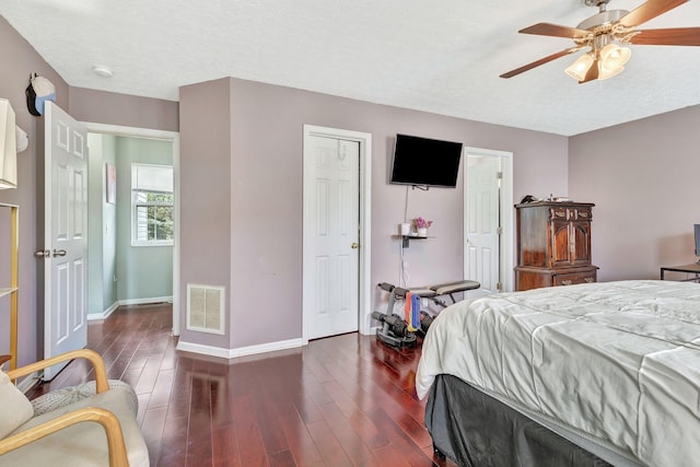 5601 Murphywood Xing, Antioch, TN 37013 - bedroom with dark wood finished floors, ceiling fan, and a textured ceiling