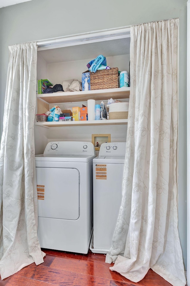 5601 Murphywood Xing, Antioch, TN 37013 - washroom with washing machine and clothes dryer and dark wood-type flooring