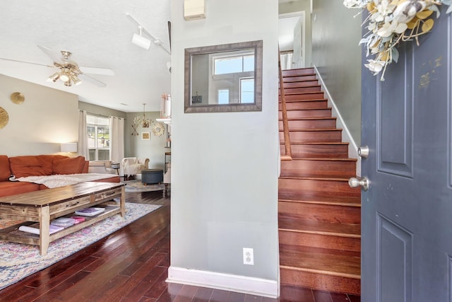 5601 Murphywood Xing, Antioch, TN 37013 - staircase with wood finished floors, a ceiling fan, and rail lighting