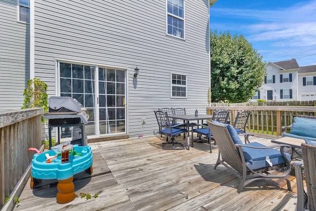 5601 Murphywood Xing, Antioch, TN 37013 - wooden terrace with outdoor dining space and a grill