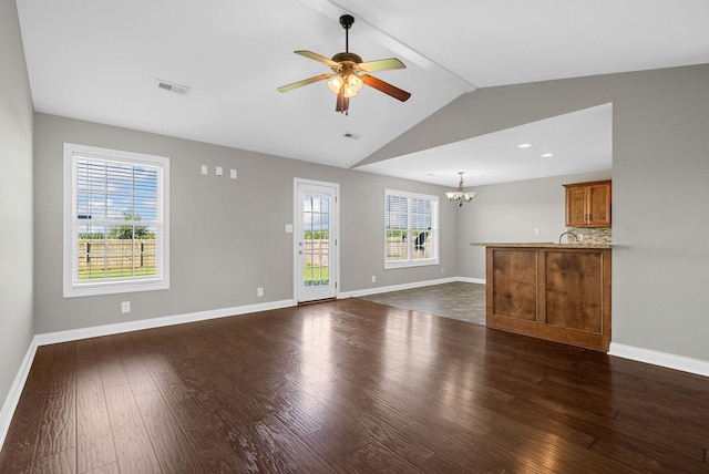 141 Bob White Trl, Oak Grove, KY 42262 - unfurnished living room featuring a chandelier, dark wood-type flooring, vaulted ceiling, and a ceiling fan
