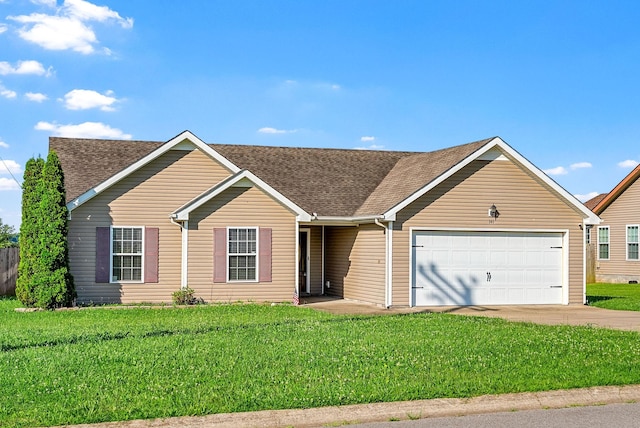 141 Bob White Trl, Oak Grove, KY 42262 - ranch-style house featuring roof with shingles, an attached garage, a front yard, and concrete driveway