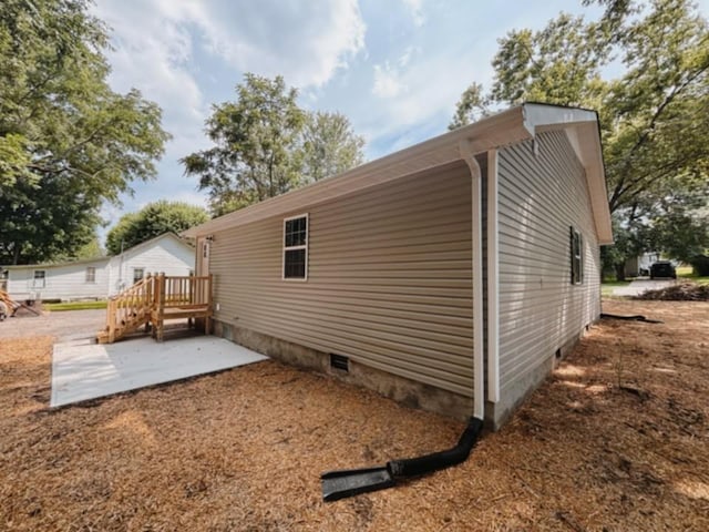 210 N Vine St, Tullahoma, TN 37388 - view of home's exterior with a patio and crawl space