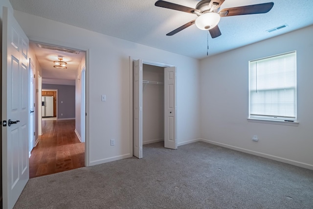 218 Susie Dr, Winchester, TN 37398 - unfurnished bedroom with carpet flooring, a closet, and ceiling fan