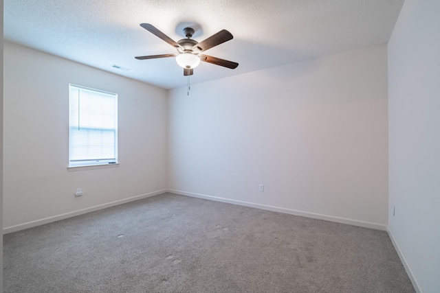 218 Susie Dr, Winchester, TN 37398 - carpeted empty room featuring a ceiling fan and a textured ceiling